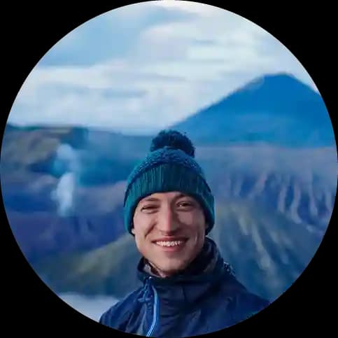 Aidan Lowson smiling at mount Bromo Indonesia